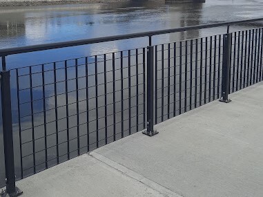 Black Color Railing Near Pond