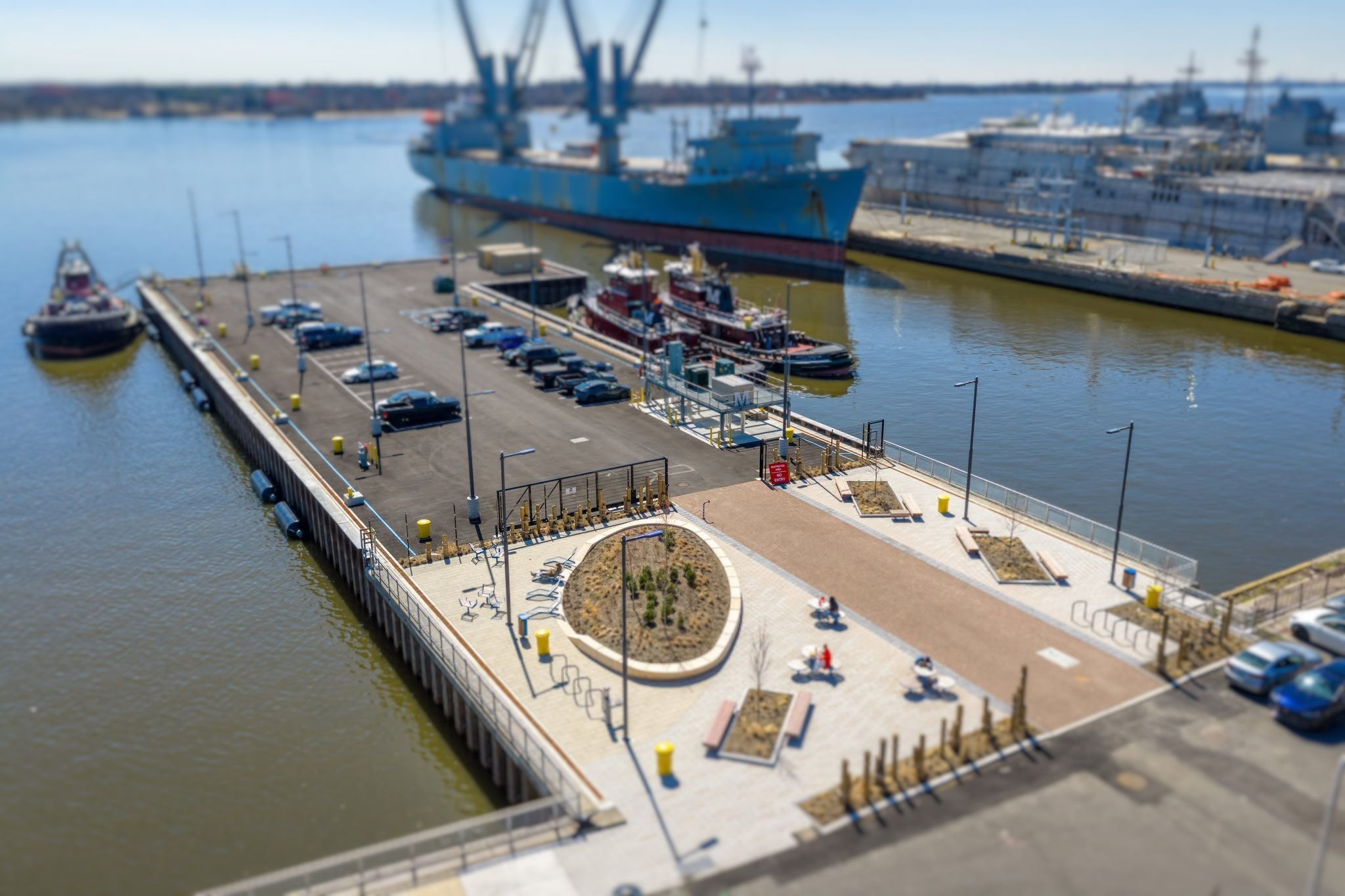 An automated gate at a naval yard pier